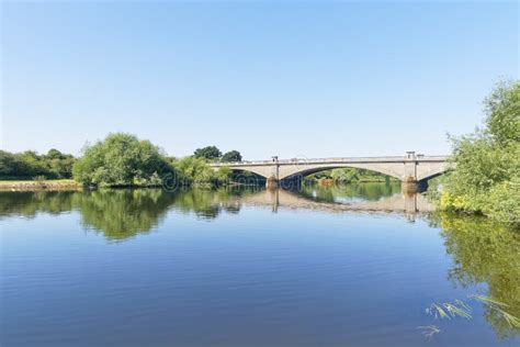 A Flat Calm River Trent Flowing Under Gunthorpe Bridge Stock Photo