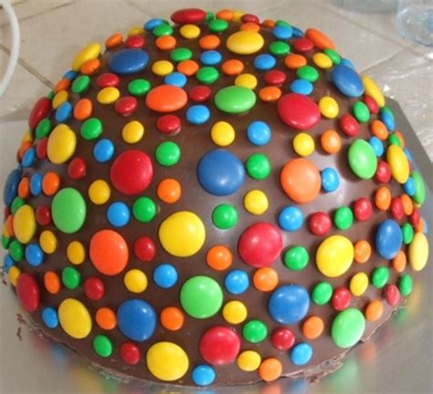 Colorful Pinata Cakes With Chocolate Cover And Decorated With M And Ms