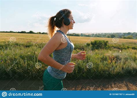 Woman Jogger Working Out In The Morning Sunny Day Stock Image Image