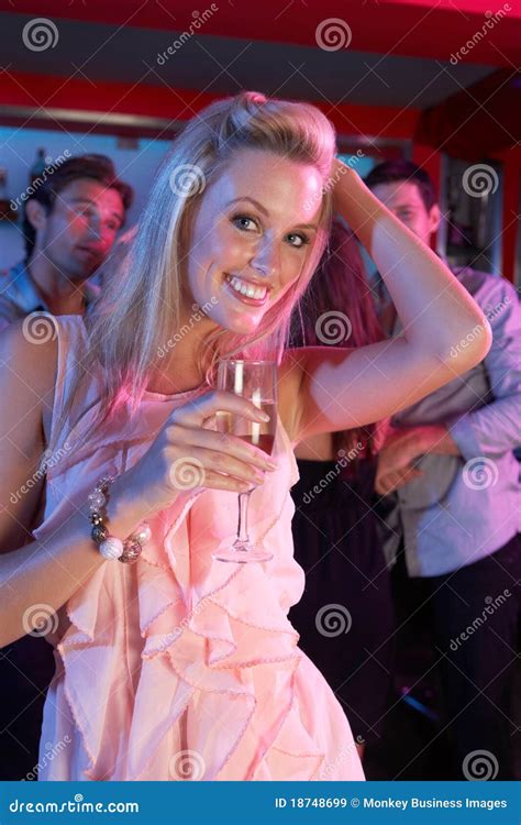 Young Woman Having Fun In Busy Bar Royalty Free Stock Images Image