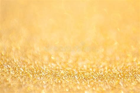 Gold Abstract Bokeh Glitter Texture Background Filled With Shiny Gold