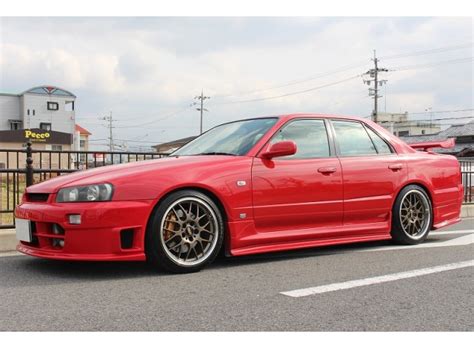 Buy a used sports car Nissan Skyline (R34) from Japan