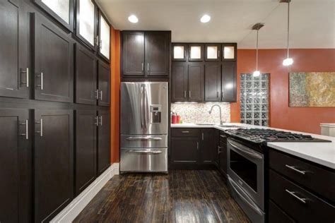 Let us help you with your home improvement project. 10 Beautiful Kitchens with Dark Hardwood Floors