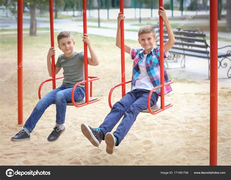 Cute Boys On Playground — Stock Photo © Belchonock 171081758