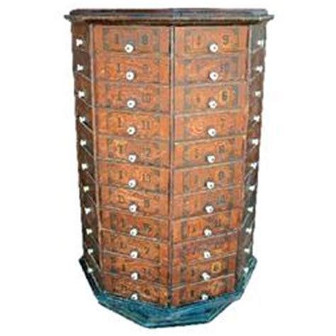 Bring bolt accounts to your store. Revolving nut & bolt cabinet, 8 sided w/88 pie-shaped ...