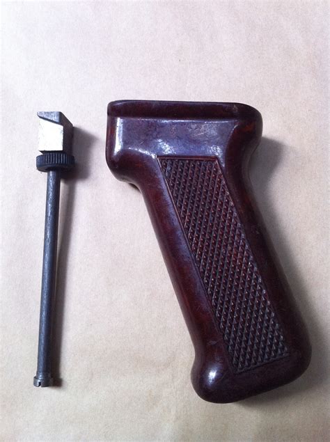 Ak Bakelite Pistol Grip W Bolt And Nut And Ar15 Muzzle Protector