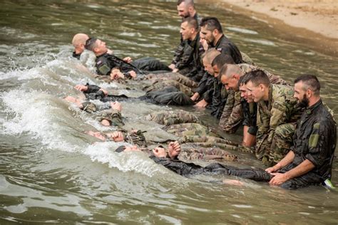 Guard Dives Into Water Survival Training In Poland Article The