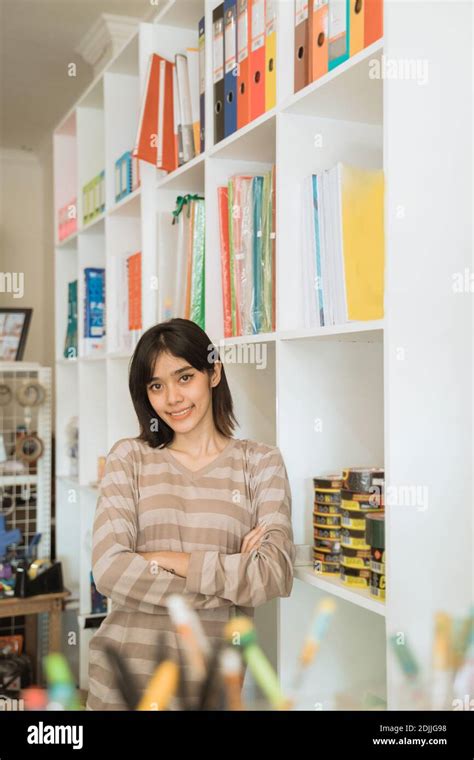 Portrait Cheerful Young Girl Entrepreneur Working In A Stationery Shop