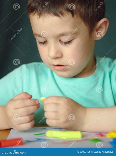 Boy Playing With Color Play Dough Stock Photo Image Of Expression