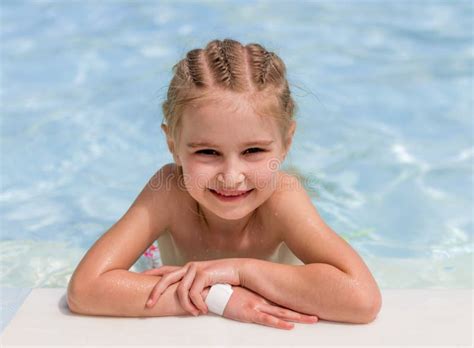 Smiling Girl Swim To The Poolside Stock Photo Image Of Freedom Active