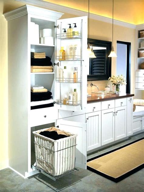 Custom cabinetry that's built to order every time. linen cabinet with hamper cabinets bathroom corner white ...