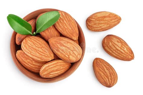 Almonds Nuts With Leaves In Wooden Bowl Isolated On White Background