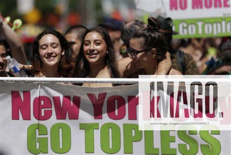 Shirtless Marchers Move On The Streets Towards Bryant Park At The Go