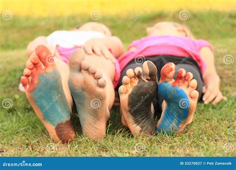 Painted Soles Of Little Kids Girls Royalty Free Stock Photography