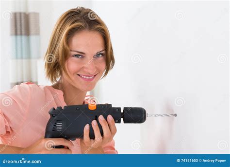 Woman Making Hole With Drill Machine Stock Image Image Of Adult Beauty 74151653