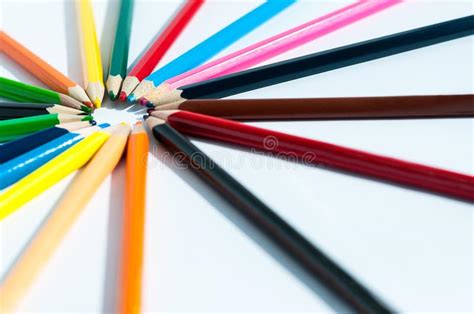 Colored Pencils Stacked In A Circle Inside The Pins Stock Photo Image