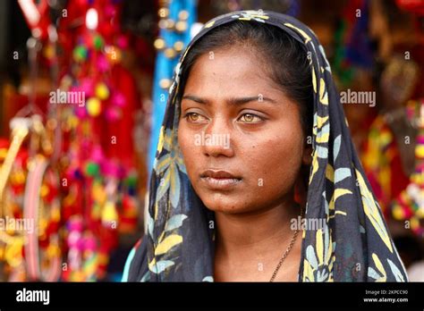 A Portrait Of An Indian Kalbelia Tribal Young Girl With Green And