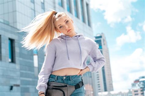 Outdoors Recreation Teen Stylish Girl With Ponytail Standing On Urban