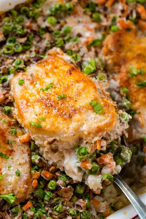 Pork loin chops are stuffed with a mixture of couscous, currants, and pine nuts, then coated in marmalade, and baked. Easy Pork Chops and Rice - Oh Sweet Basil