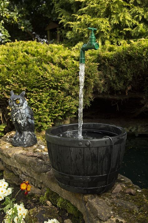 Build this diy solar garden fountain from a galvanized tub and awesome water plants! Pin on Diy water fountain