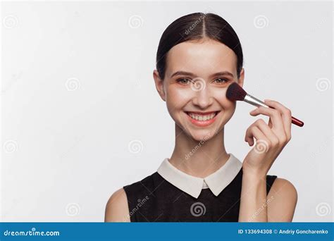 Woman Holds Makeup Brush In Her Hand Stock Photo Image Of Clean