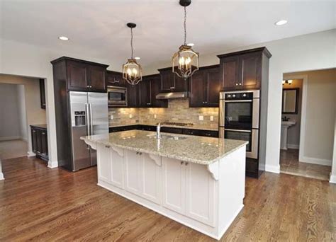 Painting kitchen cabinets is a big job, and it's tempting to want to take shortcuts. kitchen island - gonyea | Popular kitchen colors, Dark kitchen cabinets, Kitchen colour schemes