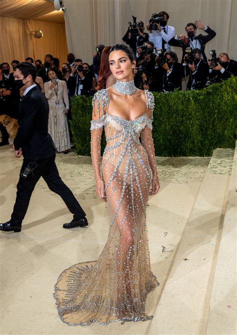 Kendall Jenner Channels My Fair Lady At Met Gala In Nearly Nude Crystal Fringed Gown The