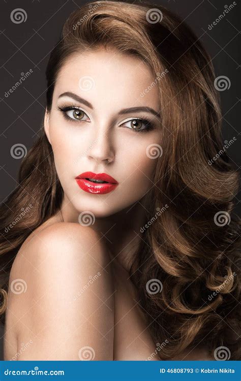 beautiful woman with evening make up red lips and curls beauty face stock image image of