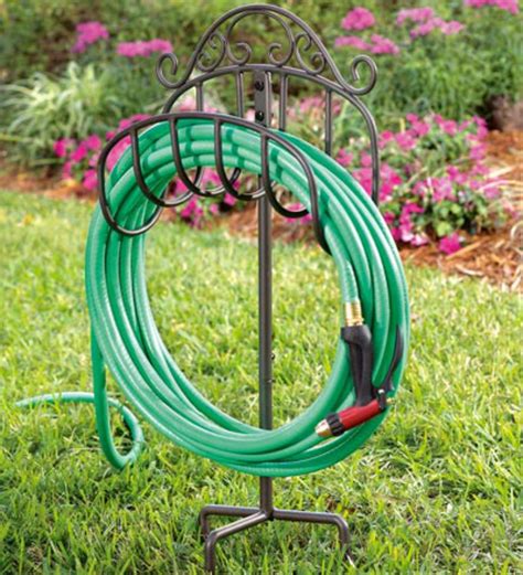 Graceful Scrolls Of Wrought Iron Give Our Lightweight Movable Hose Holder An Elegant Appearance