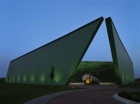 Trapezoid Shaped Eye Bank Building Hugs A Slope Of Stepped Green Terraces