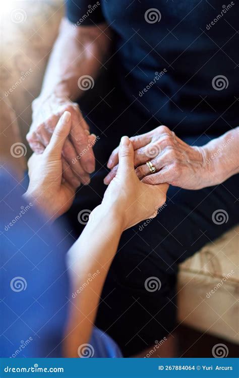 Hold My Hand In Your Time Of Need A Nurse Holding An Elderly Womans