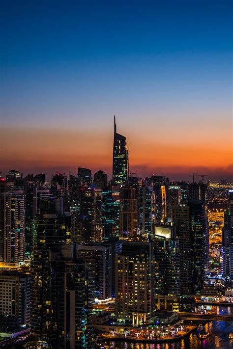 Download Wallpaper 800x1200 Night City Skyscrapers Sunset Aerial
