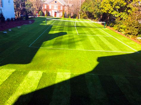 Grass courts are made of grasses in different compositions depending on the tournament. Backyard Tennis Court With Wimbledon Stripes - Raleigh ...