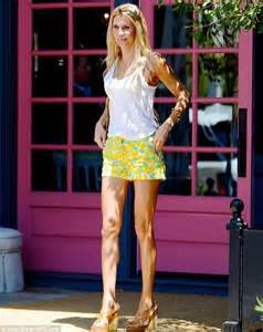 Brandi Glanville Highlights Her Long Slender Limbs In Tiny Shorts For