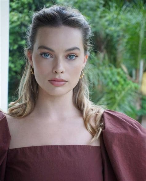 Margot robbie is suddenly alight with an unusual sort of joy, remembering. MARGOT ROBBIE at a Photoshoot, 2019 - HawtCelebs