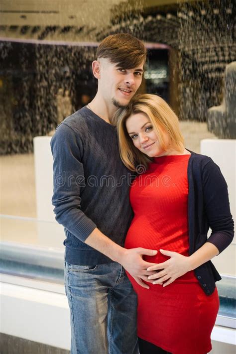 Pregnant Wife And Husband Spend Time Together In Shopping Center Stock Image Image Of
