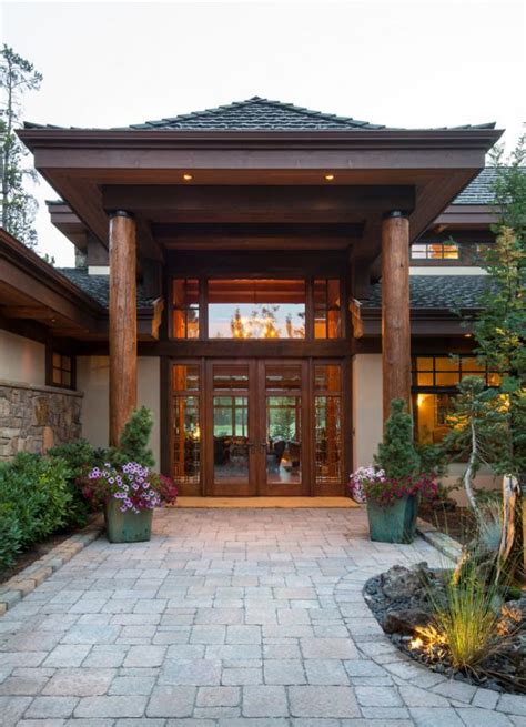 When designing your new home, think about how your home can be built to support owning less stuff. 17) Asian entry pagoda style roof with large wood post ...