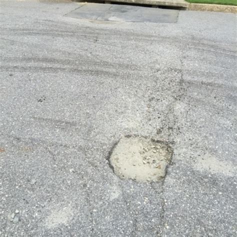 Pothole Leading To Street Drainage Gutter Issue Gwinnett County GA SeeClickFix