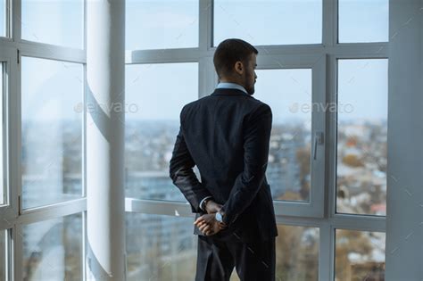 A Man In Suite At The Window Stock Photo By Artfotodima Photodune
