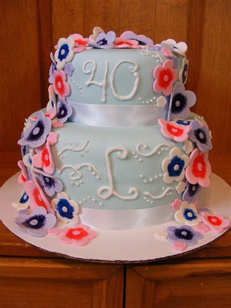If you are searching for a totally personalized wedding anniversary cake topper that is much more than just that, here is a ceramic shapshot of a time in their history together. 40Th Anniversary Cake - CakeCentral.com
