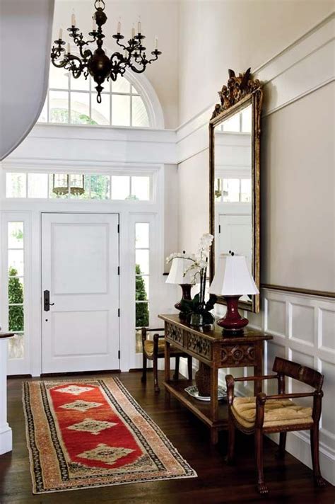 The High Ceiling Foyer Is Outfitted With Antiques Collected Over The