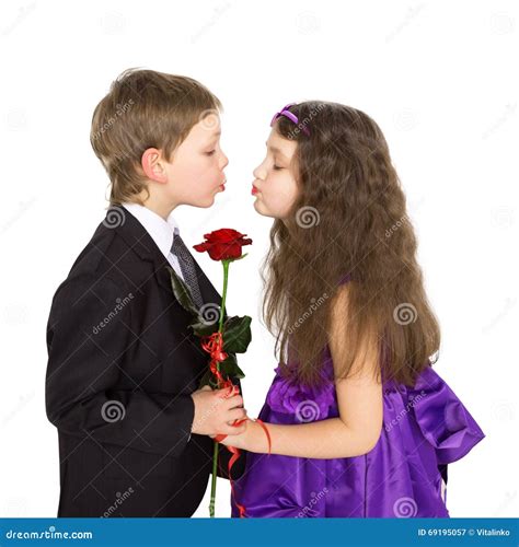 Kids Love Concept Little Boy And Girl Kissing Stock Photo Image