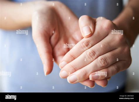 Close Up Rubbing Hands Woman Hi Res Stock Photography And Images Alamy
