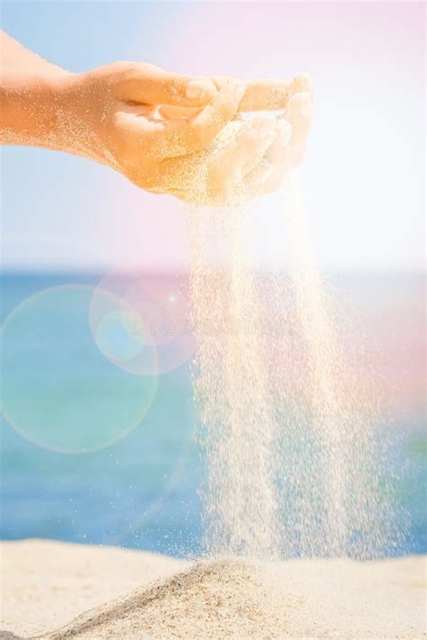 Hands Are Pouring Sand By The Sea Stock Photo Image Of Finger Time