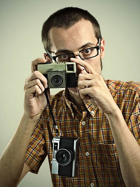Man Takes Picture With Old Polaroid Camera Stock Photos Pictures