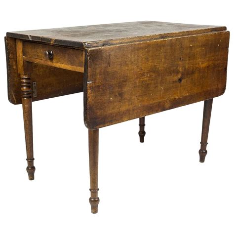 Timeless and charming, add a traditional, oak drop leaf dining table to your home. Edwardian Drop-Leaf Kitchen Table at 1stdibs