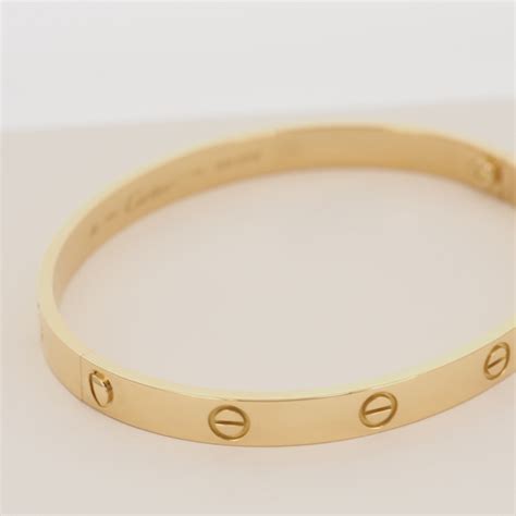 Cartier 18k yellow gold gorgeous love bracelet mens size 10. CARTIER 18K YELLOW GOLD GORGEOUS LOVE BRACELET MENS SIZE ...