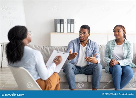 Young Black Couple On Meeting With Marital Counselor Working On Their Relationship At