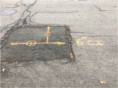 Example Of A Spray Painted Marking On A Road By Utility Company