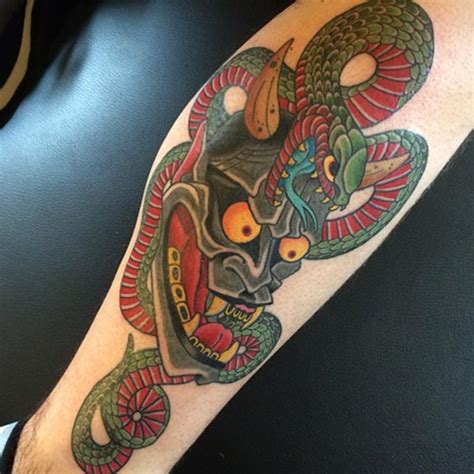 The hebi or snake tattoo in japanese culture signifies transformation or rebirth. Colorful Traditional Japanese Snake With Hannya Tattoo ...